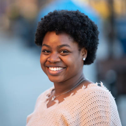 Home beautiful haitian american girl portrait with pretty smile looking at camera